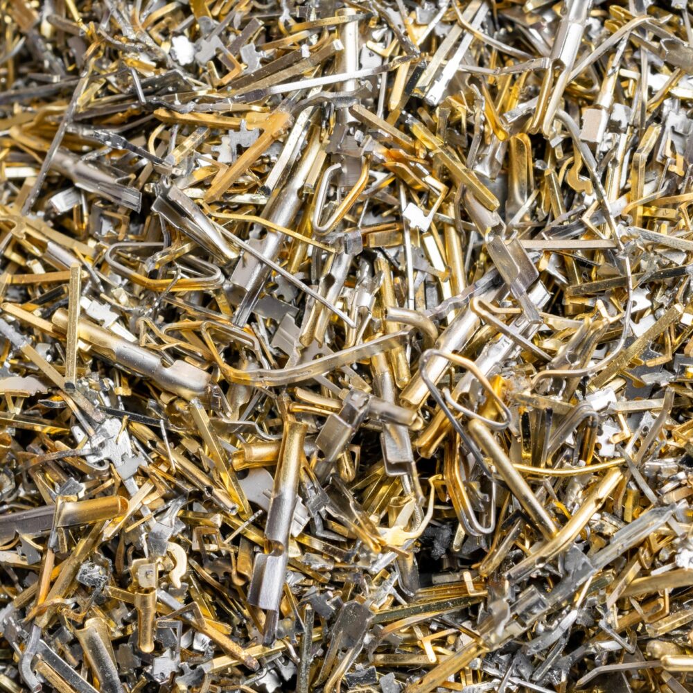 industrial gold waste from electronic components. background