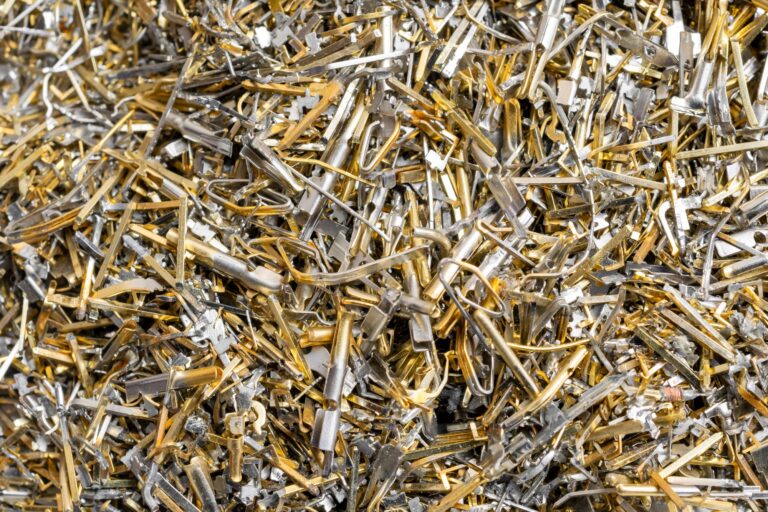 industrial gold waste from electronic components. background